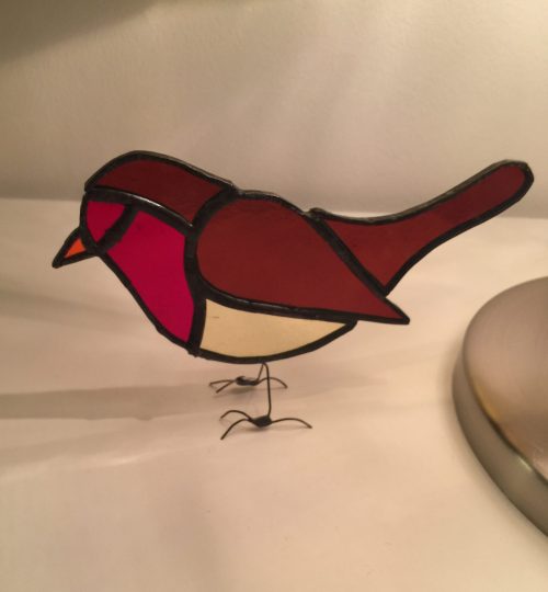 Een roodborstje voor in het raamkozijn.